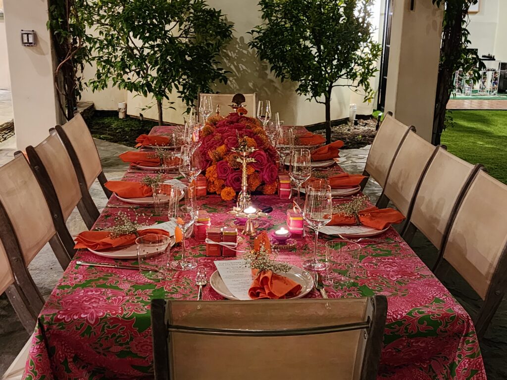 Outdoor table set with colorful floral centerpiece