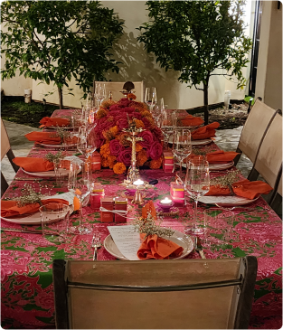 Outdoor table setting with colorful floral centerpiece